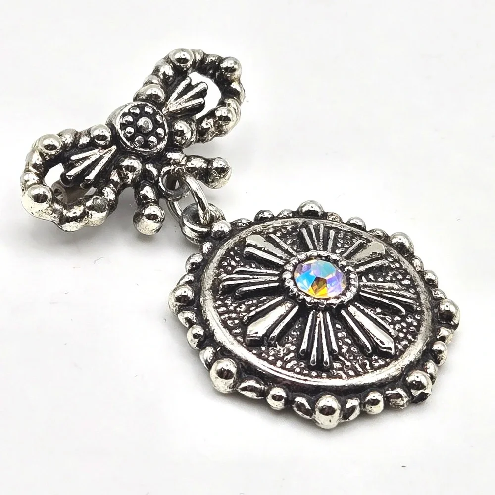 Vintage Silver Tone Bow Sunburst Medallion Brooch Pin Aurora Borealis Rhinestone